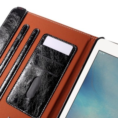 Apple iPad Pro 9.7" solīds atvēramais melns ādas futrālis, grozās 360° grādu apjomā / Vacins.lv